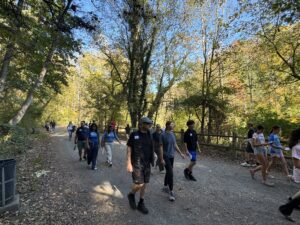 Group walking down Forbidden Drive in Wissahickon