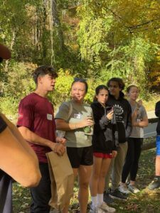 Teens and adults talking in Wissahickon